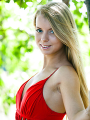 Erotic picture of Stella Lane sensually poses outdoors baring her delectable body.