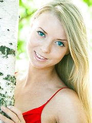 Erotic picture of Stella Lane sensually poses outdoors baring her delectable body.