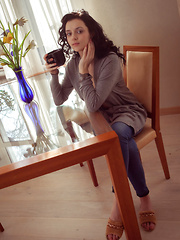 Erotic picture of Anatali shows off her beautiful tits and sweet pussy on the chair.