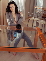 Erotic picture of Anatali shows off her beautiful tits and sweet pussy on the chair.