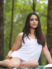 Erotic picture of Cira Nerri strips in the forest baring her delectable, nubile body.