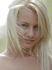 Erotic picture of Miss Perfect strips and cums while you watch