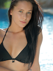 Erotic picture of Stunning gymnast Mira strips out of black bikini, stretches, flexes and cums for you