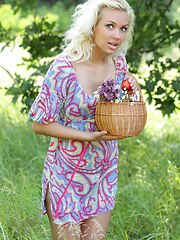 Erotic picture of Gorgeous blonde teen chick with a basket of peaches taking off clothes outdoor on the nature.