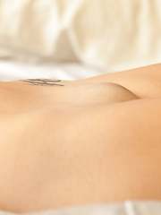 Erotic picture of Redhead babe doll Hailey shows her nice tits and pussy