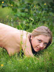 Erotic picture of Delectable cutie with excellent straight long hair posing naked on the nature near the river.
