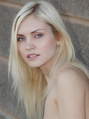 Erotic picture of Cristina A posing outdoors in russian city