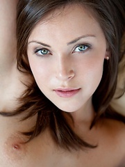 Erotic picture of Chic and elegant vixen with great body, puffy breasts and alluring face.