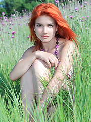 Erotic picture of Amidst the wild grass, and delicate lavander flowers, a ravishing Viola showcases her natural beauty with engagingly carefree and uninhibited poses that reminds us of lazy summer afternoons.