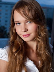 Erotic picture of Flexible teen Virginia Sun gets naked