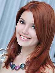 Erotic picture of Stylized poses on an elegant setting with the curvy Violla.