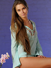 Erotic picture of Kristel showcases her fresh and naked body, charming yet alluring beauty and pink, delicate bits in front of the camera.