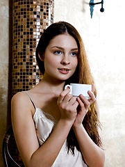 Erotic picture of Guerlain hastily takes off all of her   clothes and allow us an unobstructed view   of her delectable unshaven labia and   round, cuppable breasts with a warm,   engaging smile.