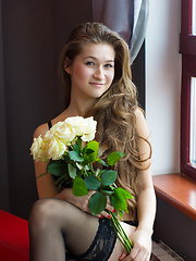 Erotic picture of Always smiling, always showing secret look. This slender nude cutie looks amazingly good in that sexy black underwear.