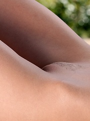 Erotic picture of Jana Cova - pulls off her colorful striped top and spreads