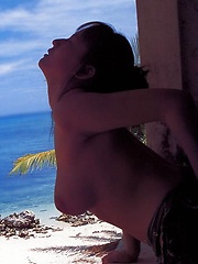 Erotic picture of Ayami Sakurai posing at the beach