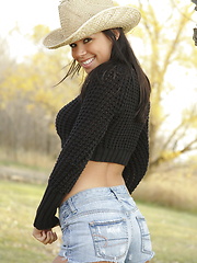 Erotic picture of Meanwhile back at the ranch there's an adorable little cowgirl named Destiny getting naked