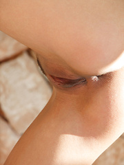 Erotic picture of Candice Luka feeling naughty in the bathtub