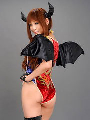 Erotic picture of Sayuri Ono Asian in long boots is batwoman waiting for victims