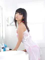 Erotic picture of Sakura Sato Asian looks amazing in white lingerie in the morning