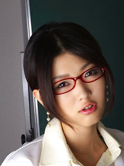 Erotic picture of Noriko Kijima Asian is erotic doctor with red fishnets and specs