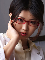 Erotic picture of Noriko Kijima Asian is erotic doctor with red fishnets and specs