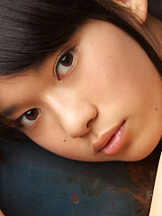 Erotic picture of Tomoe Yamanaka Asian in stockings shows nasty behind at window