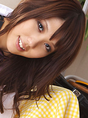 Erotic picture of Asami Tsubaki Asian in uniform spreads legs and shows panty