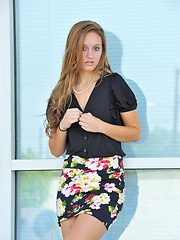 Erotic picture of Summer gives upskirt glimpses