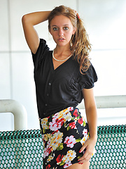 Erotic picture of Summer gives upskirt glimpses