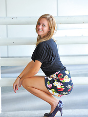 Erotic picture of Summer gives upskirt glimpses