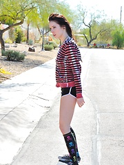 Erotic picture of Aiden gets emo and tires to skateboard topless
