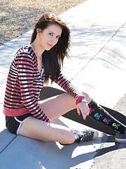 Erotic picture of Aiden gets emo and tires to skateboard topless