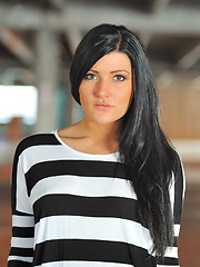 Erotic picture of Marletta in the parking garage getting naked