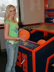 Erotic picture of Petite blonde Skye Model is out having fun in a tight top and jeans