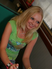 Erotic picture of Petite blonde Skye Model is out having fun in a tight top and jeans