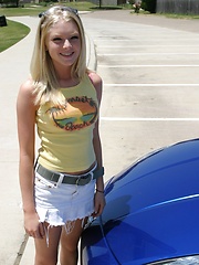 Erotic picture of Blonde teen Skye Model shows off her tight teen body by her friends car