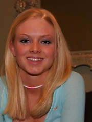 Erotic picture of Cute teen Skye Model shows off her perky tits in a very low cut top