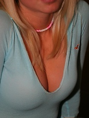Erotic picture of Cute teen Skye Model shows off her perky tits in a very low cut top