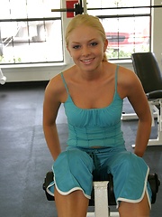 Erotic picture of Petite blonde teen Skye keeps in shape while working out at the gym