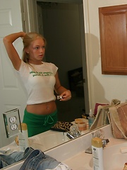Erotic picture of Watch as blonde teen Skye gets ready for her photoshoot as she puts on her makeup