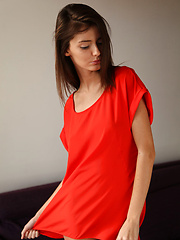 Erotic picture of Sunshine A posing naked in her red hot stiletto heels.