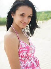 Erotic picture of Amidst the the sea glaring brightly   from the midnoon sun, Aprilia entices   us with an appetizing display of her   body\'s scrumptious assets, and frolics   among the sandy beach, uninhibited and   carefree.