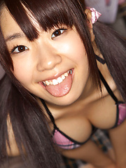 Erotic picture of Hikari Azuma Asian shows hot butt under skirt and naughty boobs