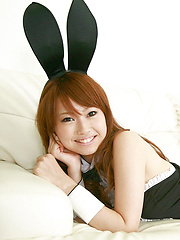 Erotic picture of Chinatsu Sasaki Asian bunny has sexy legs in fishnet stockings