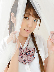 Erotic picture of Mizuho Shiraishi Asian with pigtails and uniform sits with ass up
