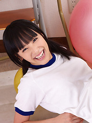 Erotic picture of Yuri Hamada Asian in sports equipment plays with balloons a lot