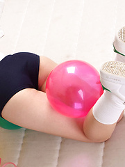 Erotic picture of Yuri Hamada Asian in sports equipment plays with balloons a lot