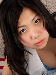 Erotic picture of Miho Takai Asian is proud owner of big boobs she has in blue bra