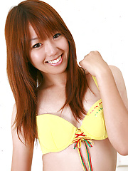 Erotic picture of Shizuka Sakura Asian with hot cans and ass in yellow goes to sea